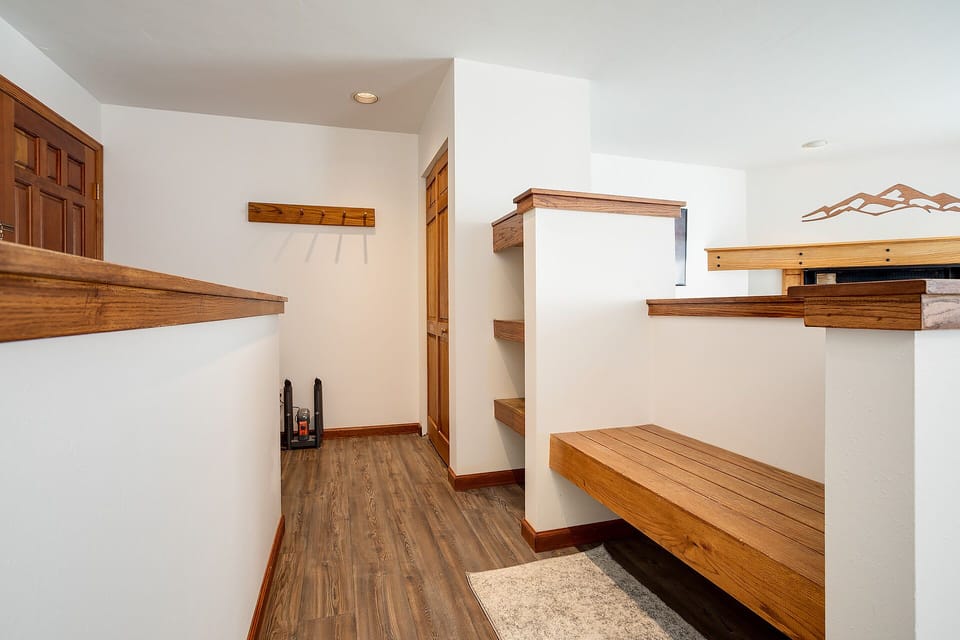 Your own walk-in closet features custom wood shelving and plenty of space to organize all your belongings during your stay.