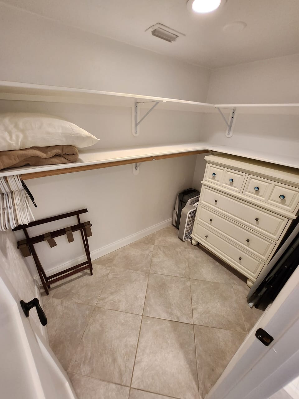 Large master bedroom closet.