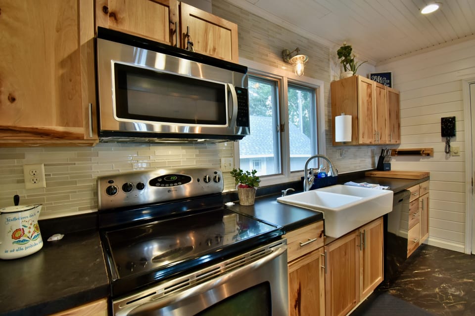 Full kitchen with stainless appliances,
Big French 2 Door refrigerator