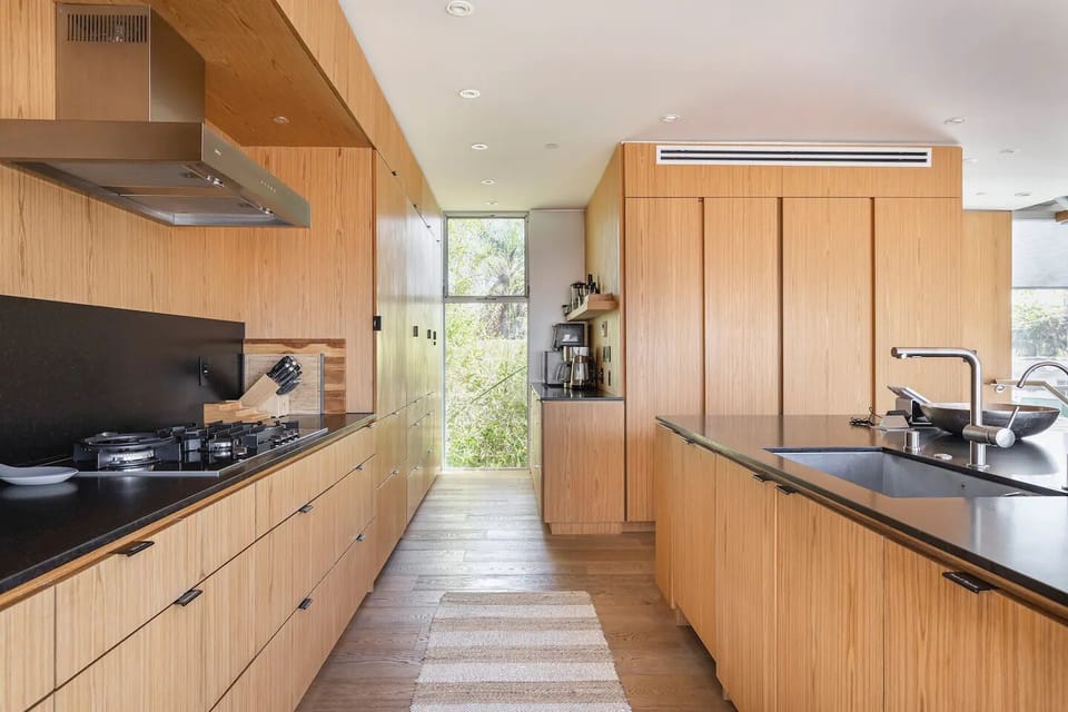 Gourmet chef's kitchen with complimentary coffee , snacks, and Nepresso machine.