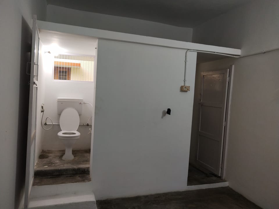 Comfortable western toilet and bathroom with geyser and shower. Separate door. 