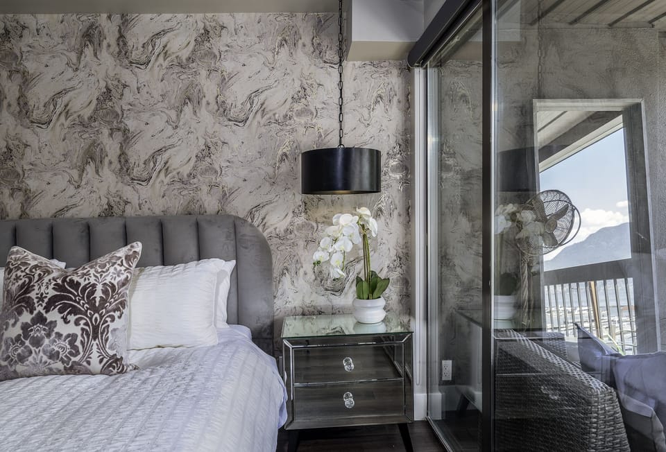 Floor to ceiling windows to capture view of the lake and mountains!