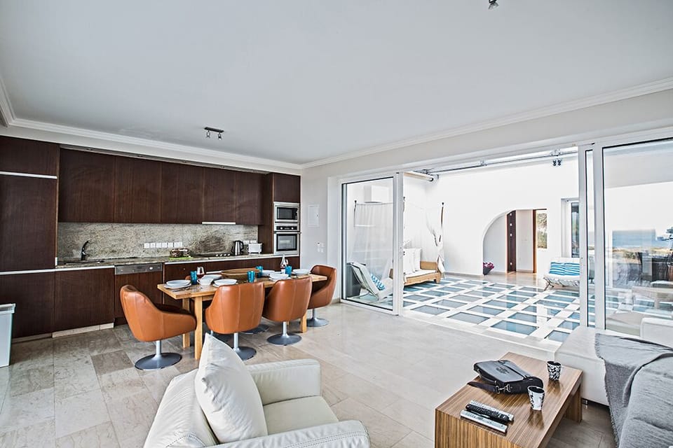 Large kitchen with dining area and separate seating area