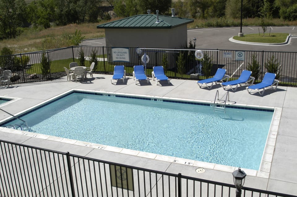 Lounge by the pool in the sunshine.
