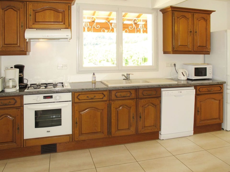 Cabinetry, Furniture, Countertop, Kitchen, Room, Property, Major Appliance, Floor, Interior Design, Building