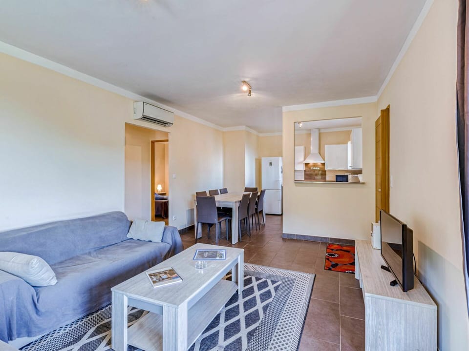 Couch, Furniture, Property, Table, Building, Wood, Lighting, Comfort, Picture Frame, Flooring