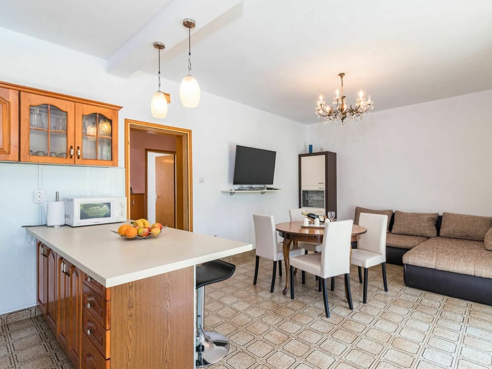 Table, Furniture, Picture Frame, Cabinetry, Couch, Countertop, Wood, Lighting, Building, Floor