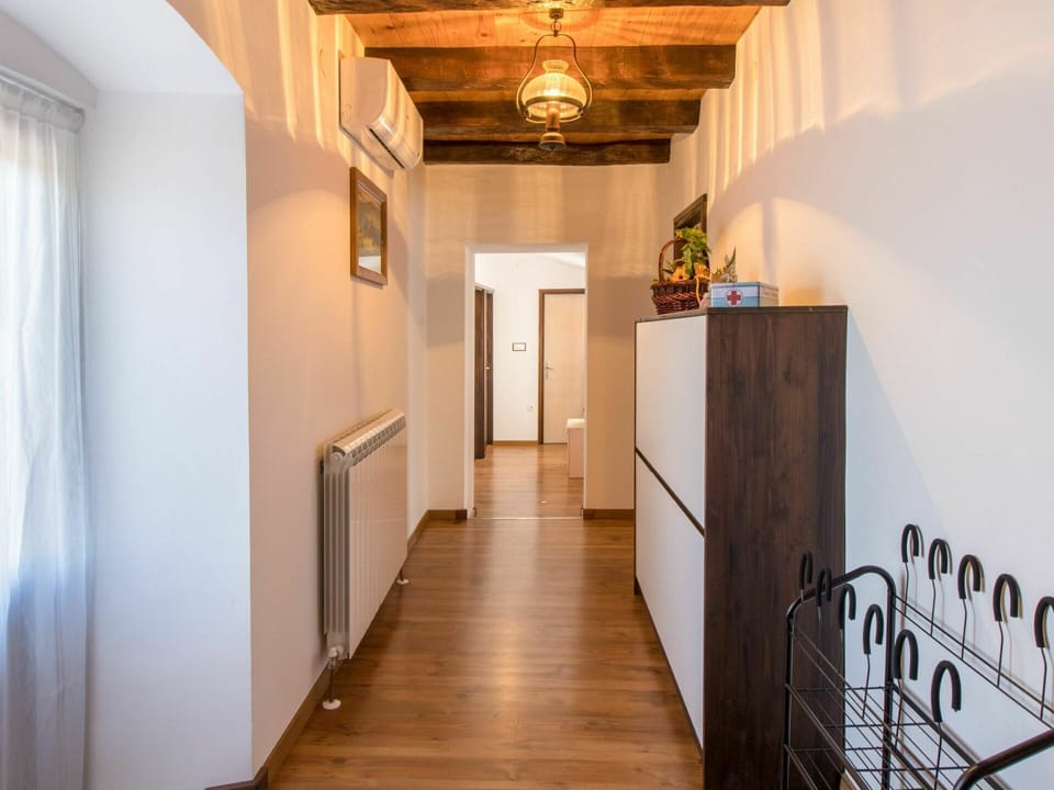 Cabinetry, Wood, Hall, Building, Flooring, Curtain, Floor, Hardwood, Door, Ceiling