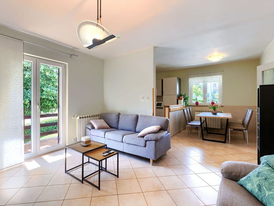 Furniture, Table, Couch, Property, Green, Lighting, Interior Design, Window, Floor, Flooring