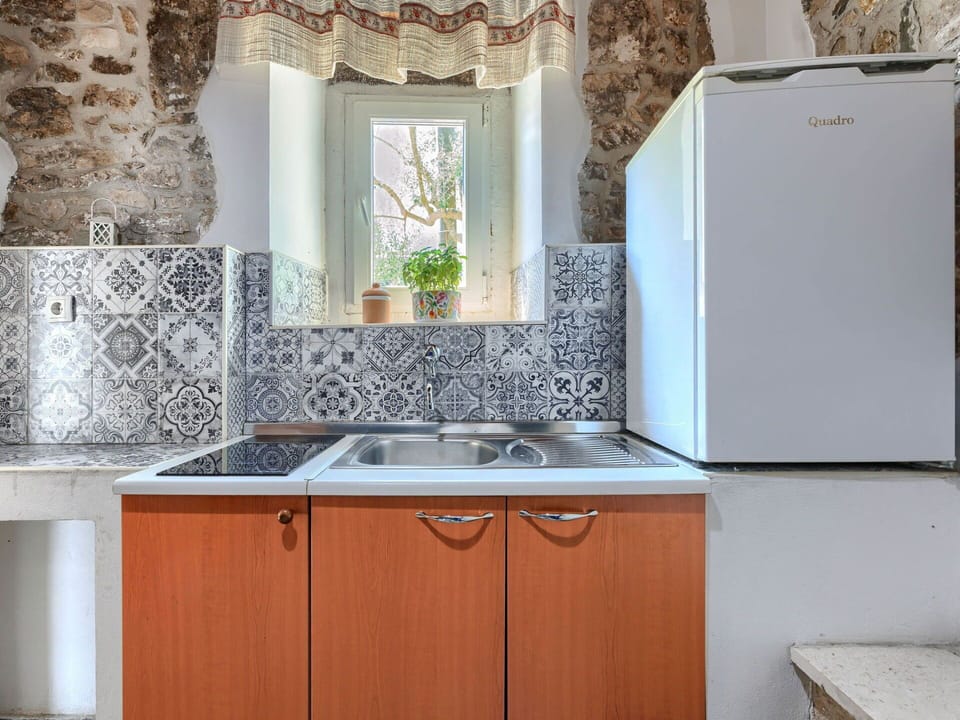 Kitchen, Major Appliance, Kitchen Appliance, Interior Design, Flooring, Countertop, Floor, Tile, Cabinetry, Kitchen Sink