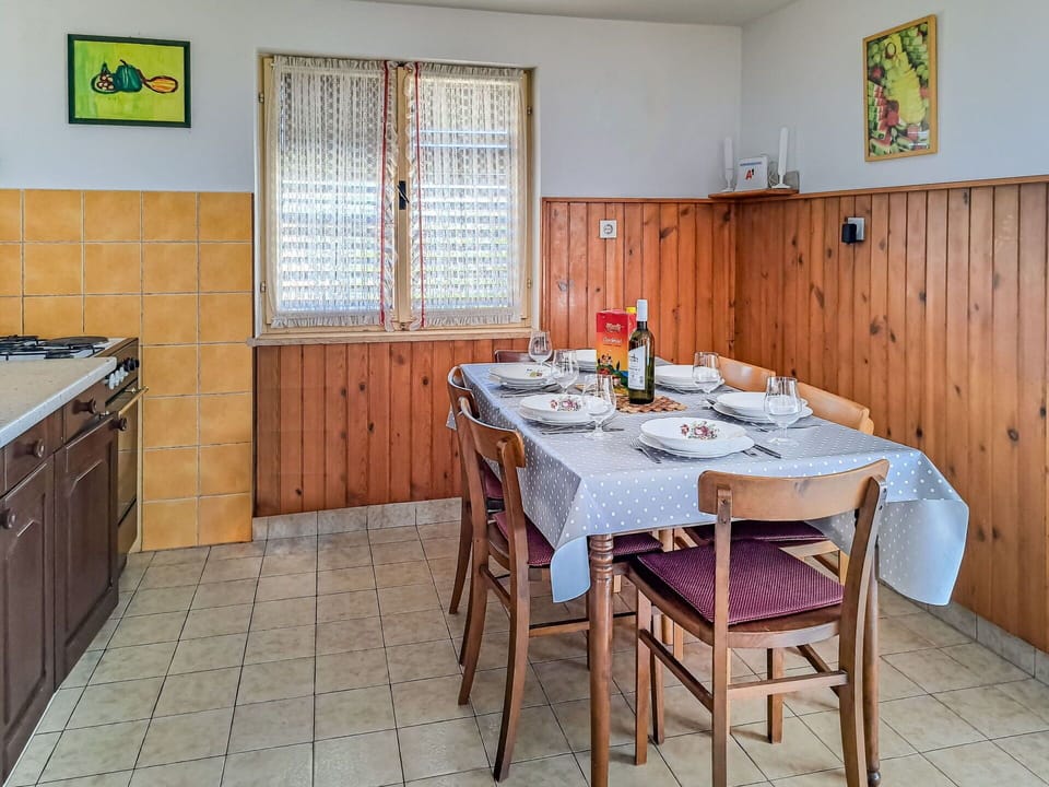Table, Furniture, Cabinetry, Green, Window, Building, Wood, Interior Design, Chair, Tableware