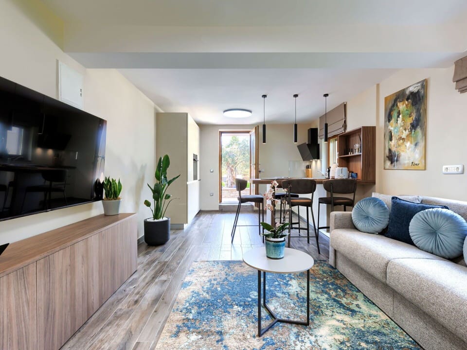 Furniture, Table, Property, Couch, Picture Frame, Houseplant, Flowerpot, Flooring, Plant, Floor