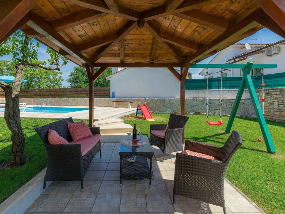 Plant, Property, Shade, Interior Design, Tree, Outdoor Furniture, Cottage, Leisure, Building, Real Estate