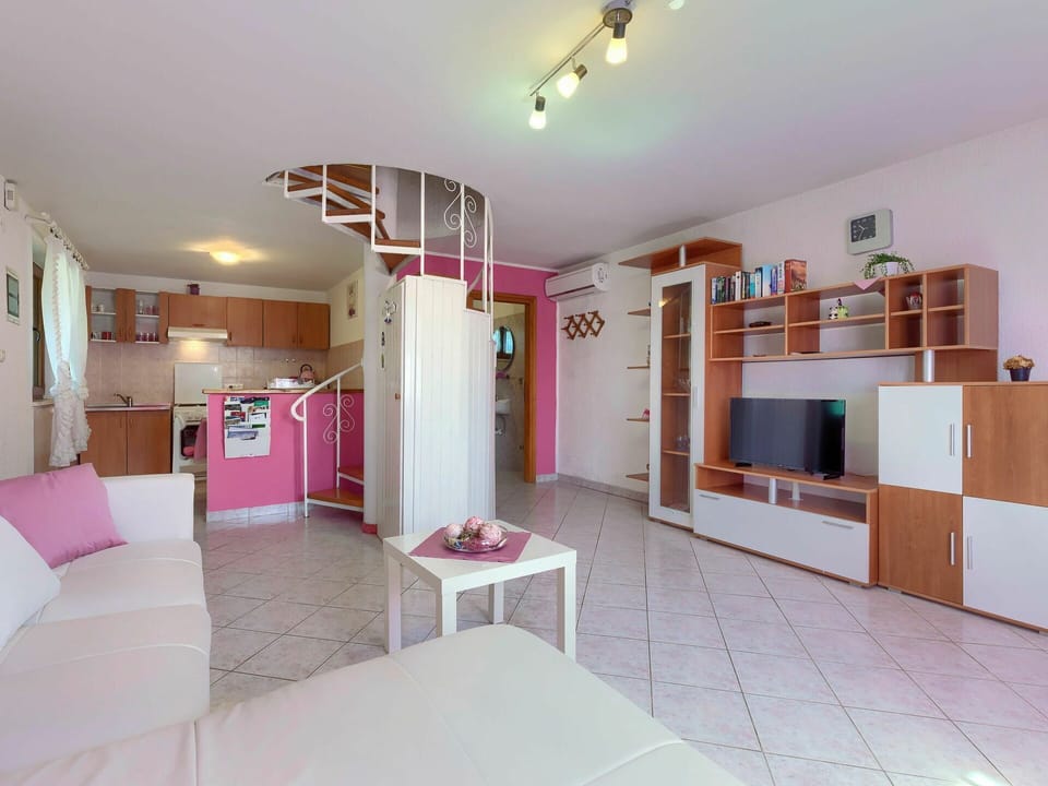 Furniture, Property, Television, Cabinetry, Interior Design, Bookcase, Floor, Living Room, Decoration, Couch