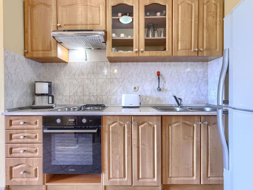 Cabinetry, Wood, Kitchen, Major Appliance, Furniture, Kitchen Appliance, Interior Design, Countertop, Cupboard, Flooring