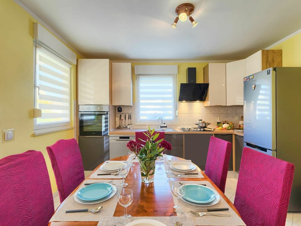 Table, Furniture, Property, Window, Tableware, Cabinetry, Chair, Dishware, Azure, Building