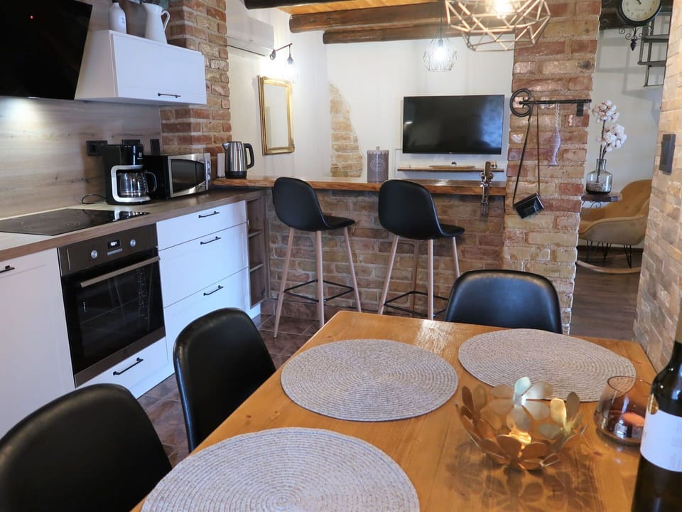 Furniture, Property, Cabinetry, Table, Chair, Interior Design, Wood, Lighting, Television, Floor