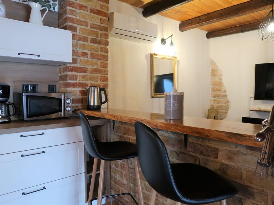 Furniture, Property, Cabinetry, Building, Picture Frame, Chair, Kitchen Appliance, Wood, Countertop, Kitchen Stove