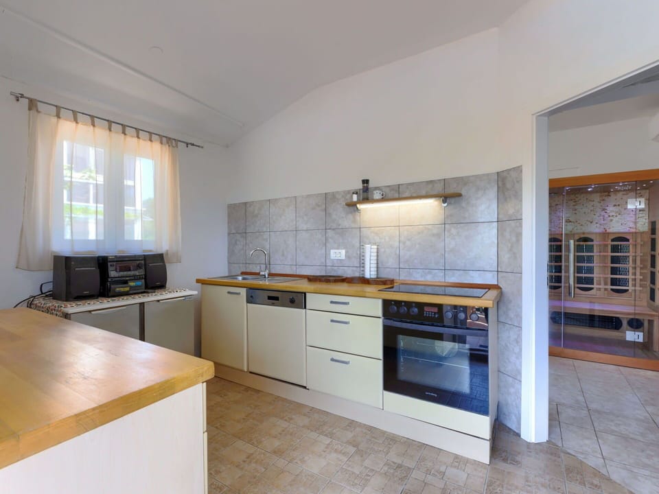 Countertop, Cabinetry, Kitchen Sink, Sink, Tap, Kitchen Stove, Kitchen, Wood, Window, Building