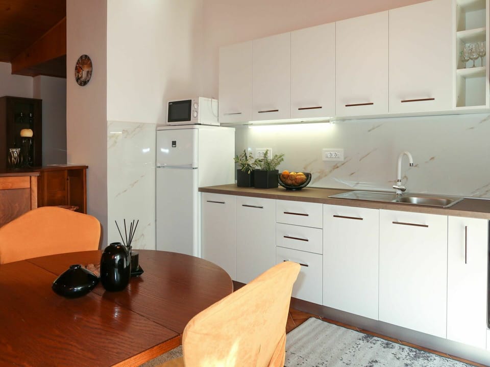 Cabinetry, Furniture, Property, Table, Building, Drawer, Countertop, Wood, Chair, Lighting