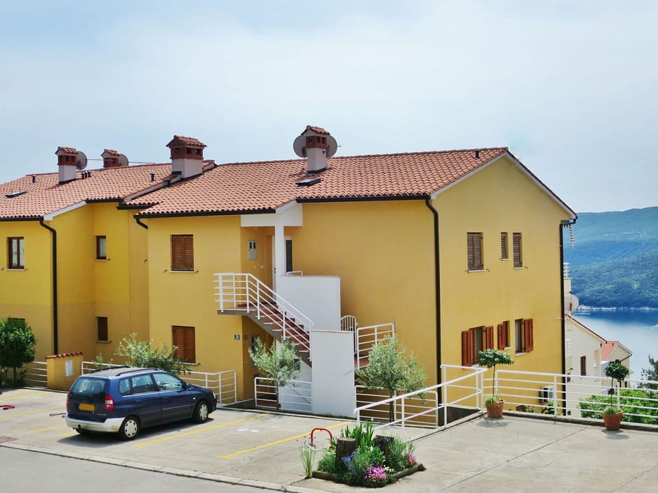 Plant, Sky, Building, Window, Car, Vehicle, House, Door, Water, Land Lot