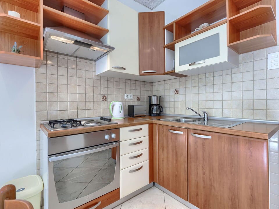 Furniture, Interior Design, Flooring, Wood, Floor, Room, Living Room, Couch, Lighting, Table