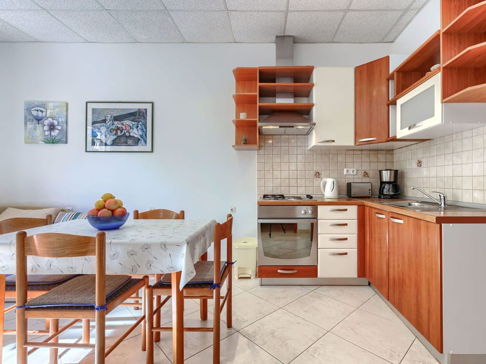 Furniture, Interior Design, Flooring, Wood, Floor, Room, Living Room, Couch, Lighting, Table
