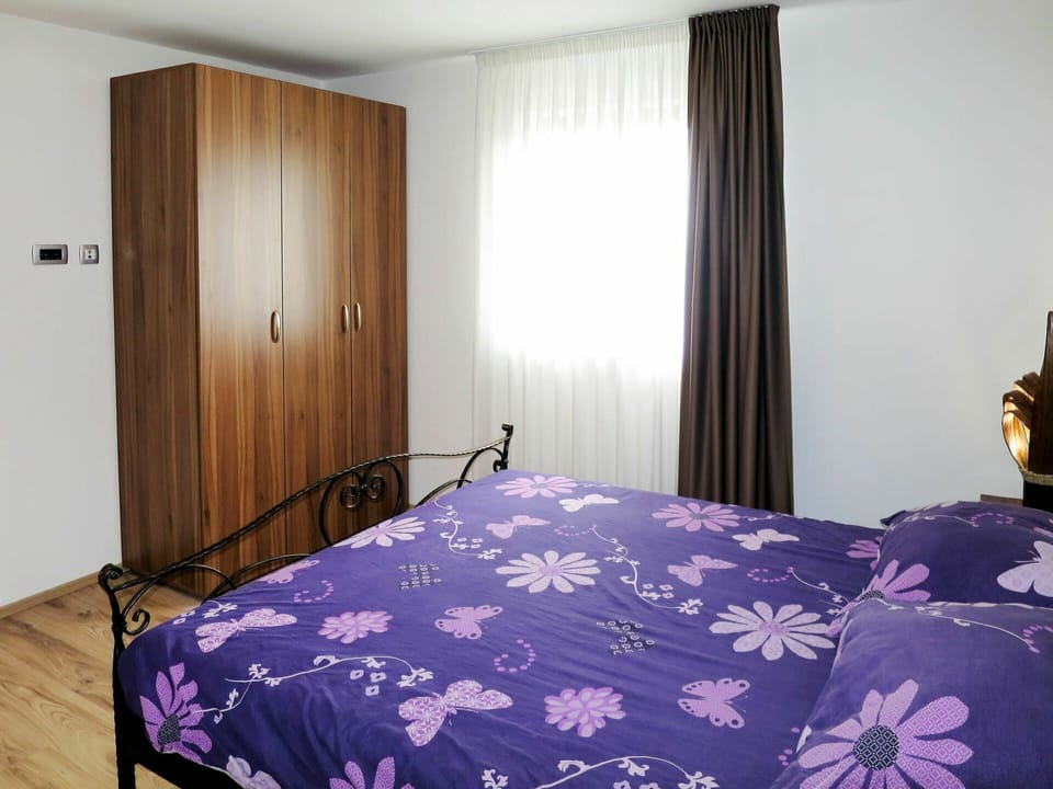 Furniture, Property, Building, Purple, Comfort, Bed Frame, Cabinetry, Textile, Interior Design, Floor