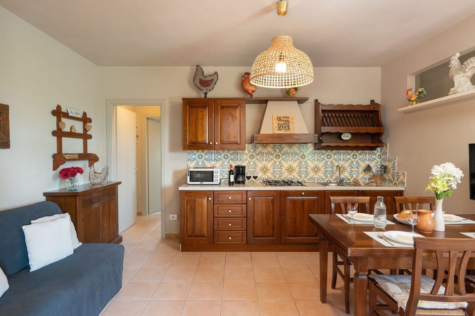 Furniture, Interior Design, Wood, Flooring, Cabinetry, Ceiling, Floor, Room, Lighting, Kitchen