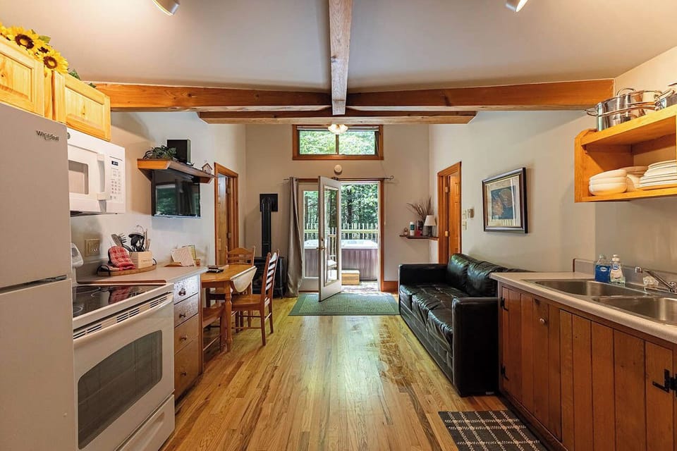 View from the front door. Kitchen, dining room and living room. Gas fireplace.