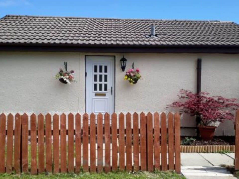 Building, Property, Plant, Window, Door, Fence, Flower, Sky, Wood, House