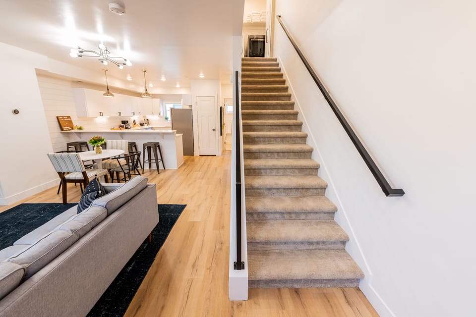 Third floor stairs to the king/queen bedrooms and master bath