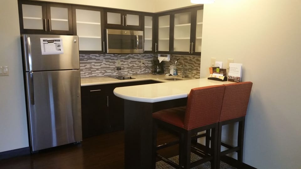 Curb your appetite by cooking a meal in your kitchen.