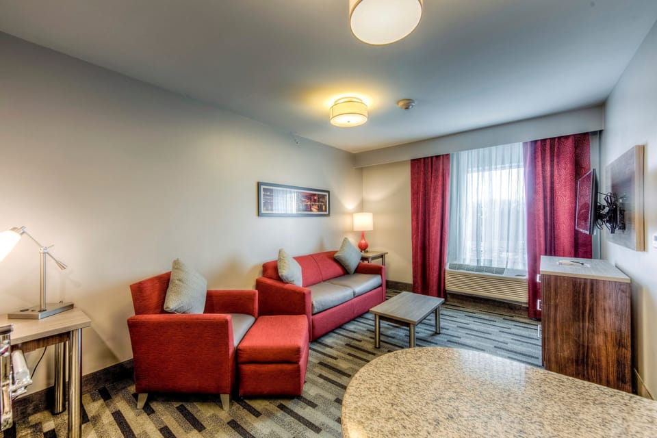 Kick back your feet and relax in the cozy living area complete with sleeper sofa