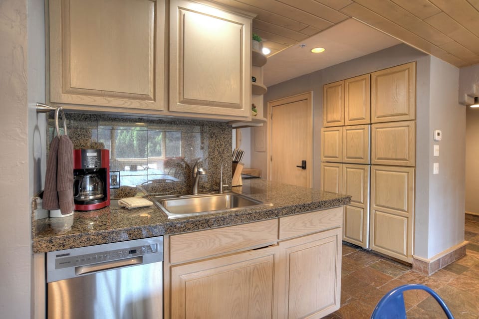 Full Kitchen with Large Fridge/Freezer with cabinet door look