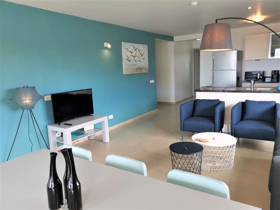 spacious living room with open kitchen