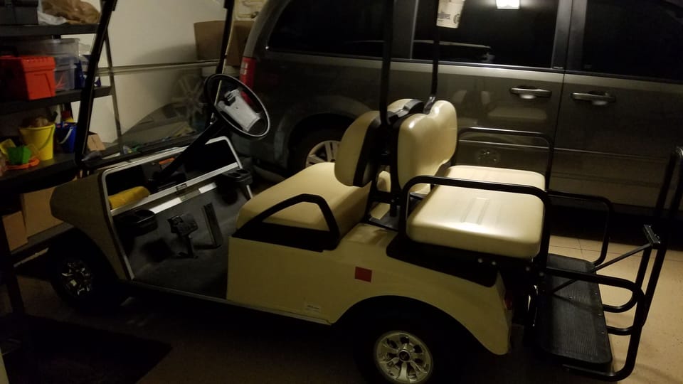 Golf cart in garage and available to guests