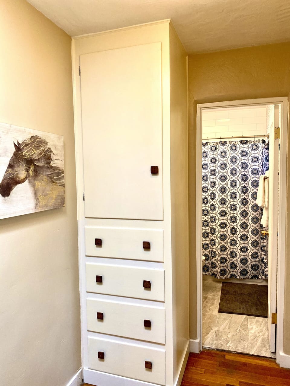 Linen closet filled with fluffy towels