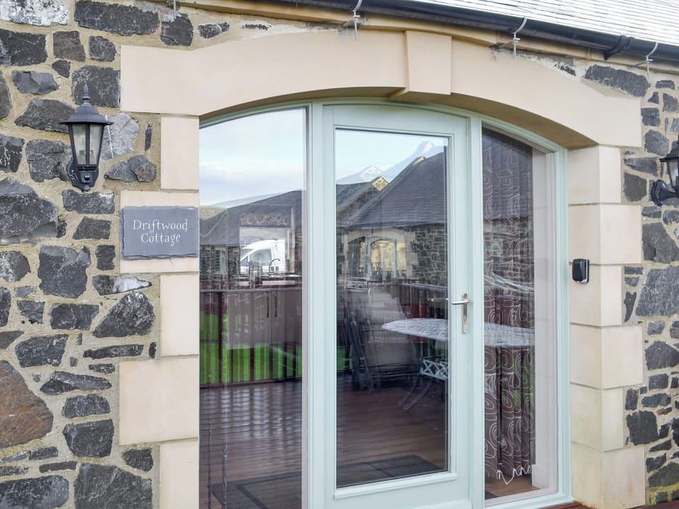 Main entrance to the holiday home | Driftwood Cottage, Newton-by-the-Sea, near Alnwick