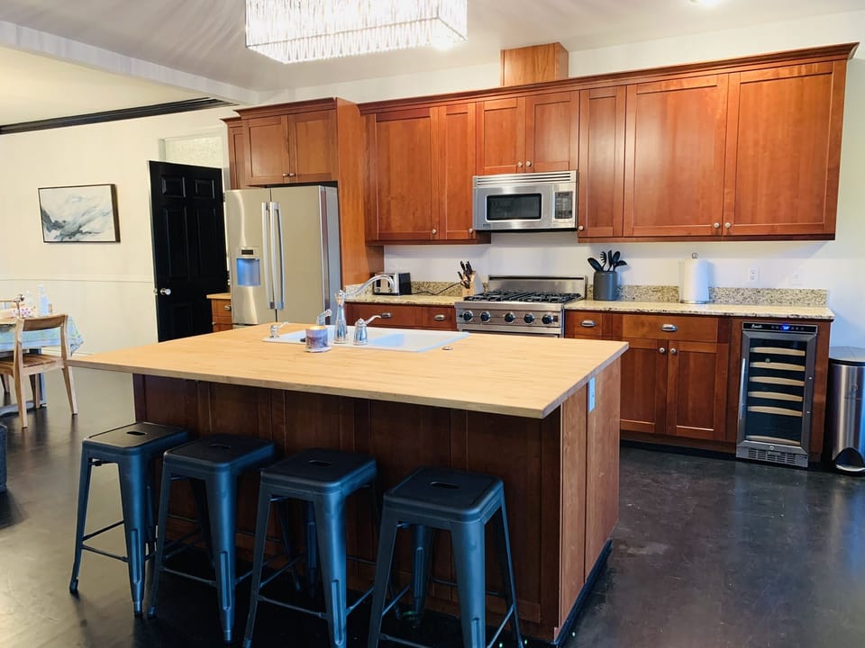 Kitchen opens up to dining room on the left