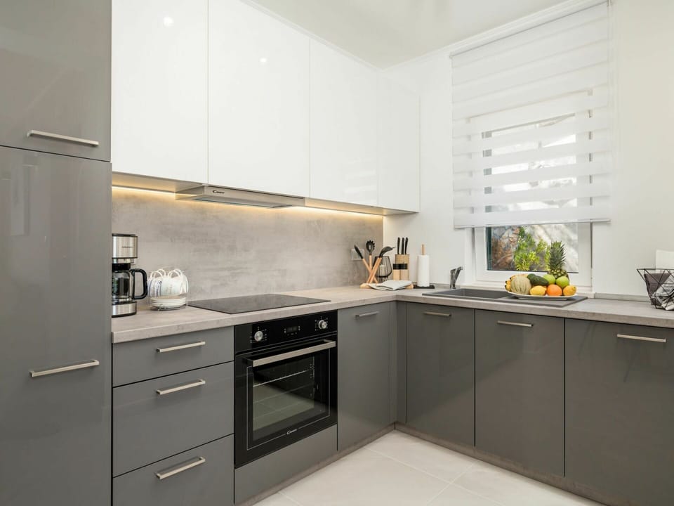 Countertop, Cabinetry, Property, Sink, Kitchen, Tap, Kitchen Stove, Product, Drawer, Kitchen Appliance