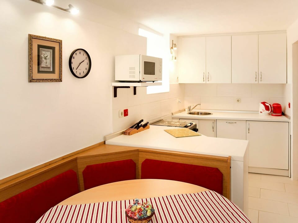 Table, Furniture, Property, Cabinetry, Picture Frame, Sink, Kitchen Sink, Countertop, Interior Design, Wood