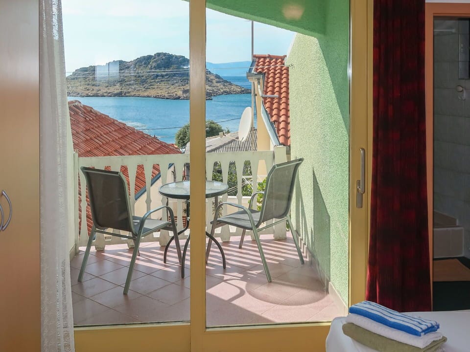 Furniture, Property, Building, Water, Sky, Door, Chair, Wood, Shade, Interior Design