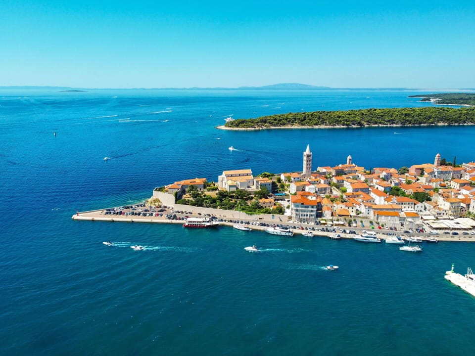 Water, Sky, Water Resources, Blue, Tower, Building, Azure, Boat, Watercraft, Coastal And Oceanic Landforms