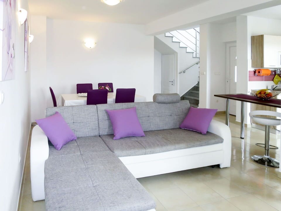 Furniture, Property, Building, Comfort, Couch, Purple, Pillow, Interior Design, Wood, Living Room