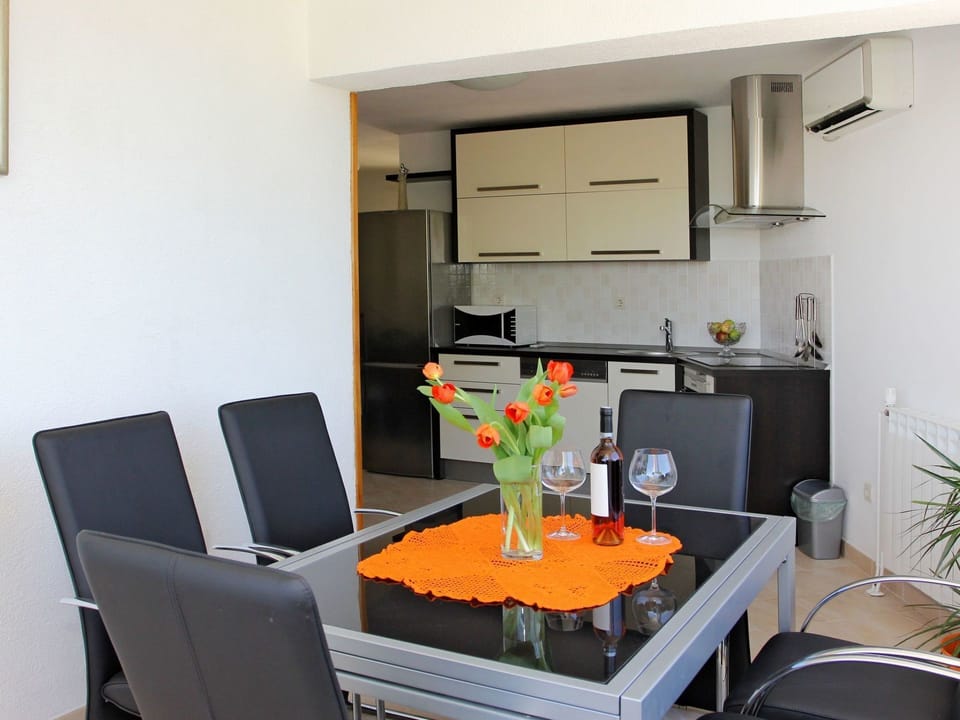 Room, Property, Furniture, Orange, Interior Design, Living Room, Building, Yellow, Table, House