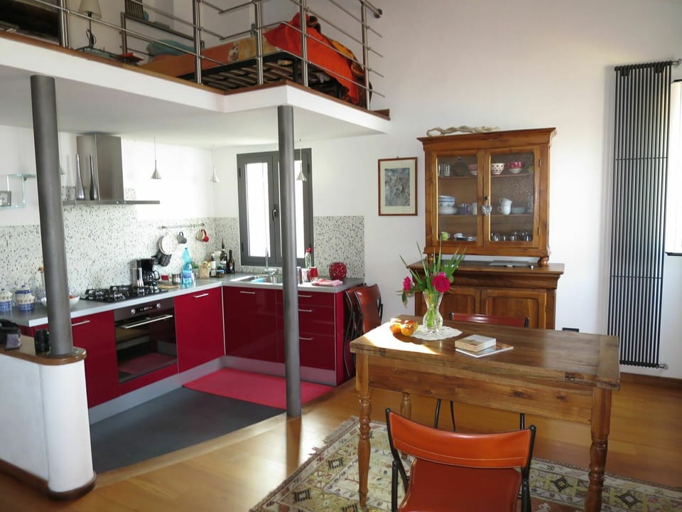 Cabinetry, Table, Furniture, Countertop, Building, Interior Design, Chair, Wood, Floor, Kitchen