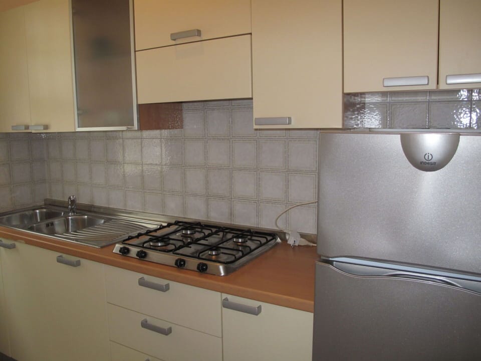 Cabinetry, Countertop, Gas Stove, Kitchen Stove, Kitchen Appliance, Cooktop, Kitchen, Home Appliance, Stove, Major Appliance
