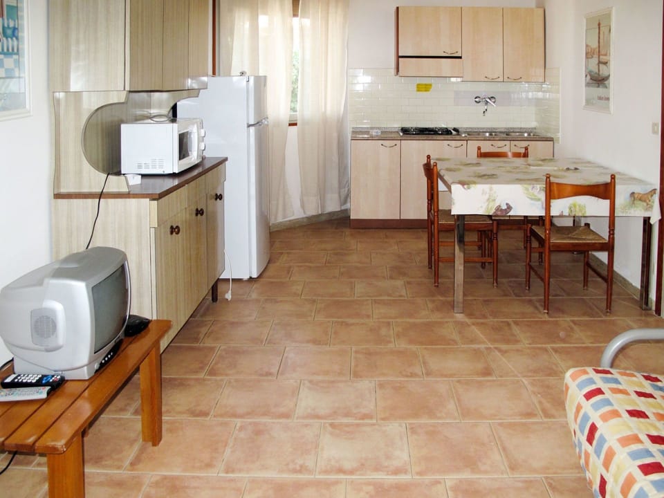 Room, Floor, Property, Major Appliance, Furniture, Building, Flooring, Tile, Hardwood, Interior Design