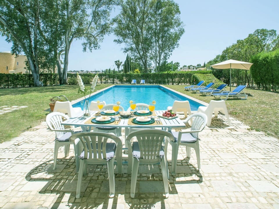 Plant, Table, Water, Sky, Tree, Outdoor Furniture, Chair, Shade, Outdoor Table, Leisure